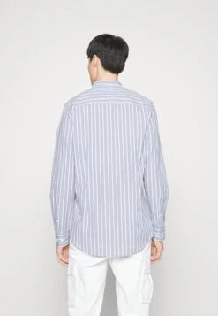 Pier One Muscle Fit Stand- Camisa - Blue -Elegancia Tienda De Ventas 6f902e87935b415aa0482cac3fb832df